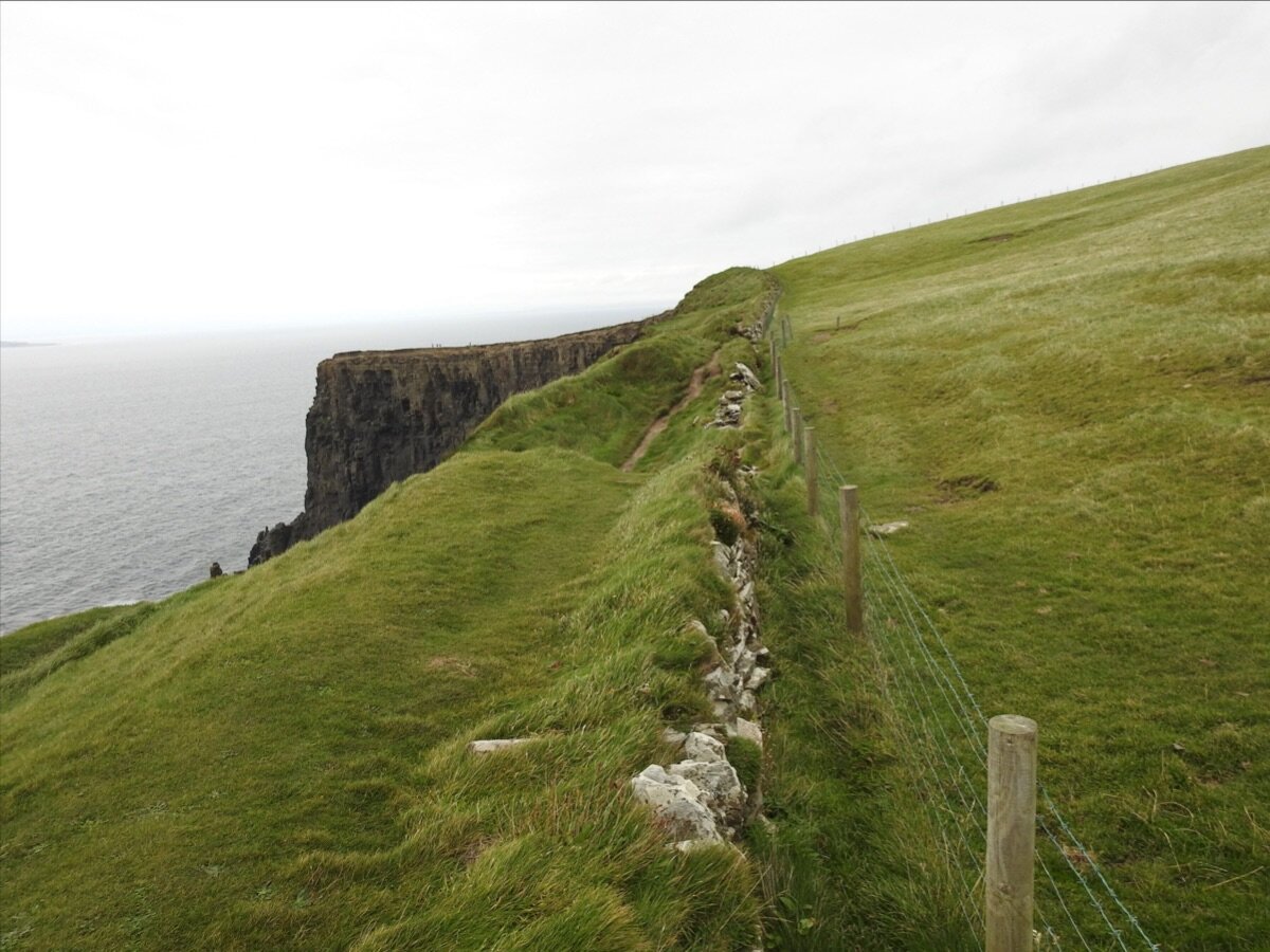 Old stone wall at the Cliffs of Moher County Clare, Ireland